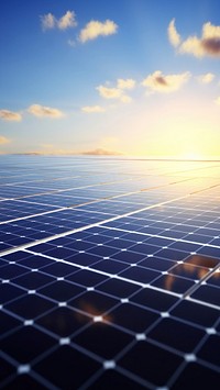 Photo of solar panels arrayed in a vast field.  