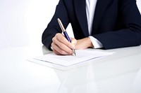 A female office worker writing document pen businesswear handwriting. 