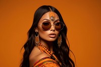 Native American glamorous female model sunglasses necklace portrait. 