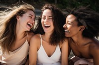 Different race women laughing adult togetherness. 