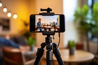 Influencer tripod filming camera. AI generated Image by rawpixel.