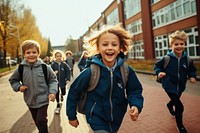 School child outdoors building. 