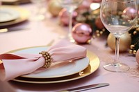 Pink gold Christmas table setting tableware. 