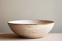 Ceramic bowl organic Swedish design porcelain. AI generated Image by rawpixel.