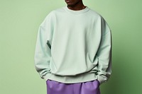 Man with pastel green sweater. AI generated Image by rawpixel.