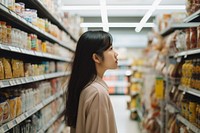 Asian woman in supermarket. AI generated Image by rawpixel.