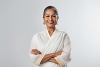 Senior indian business woman wearing traditional clothes crossing arms smiling portrait smile photo. 