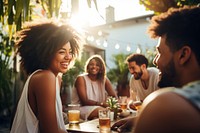 Drinking laughing outdoors summer. 