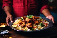 Chicken Tikka Biryani biryani plate table. 