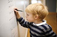 Student whiteboard writing school. 