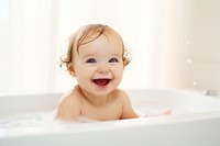 Baby portrait bathing bathtub. 