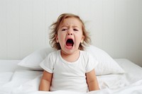 Baby yawning bed frustration. 