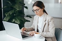 Laptop computer typing coffee. 