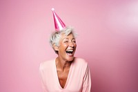 Woman short hair wearing party hat laughing adult pink. AI generated Image by rawpixel.