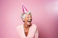 Woman short hair wearing party hat laughing adult pink. 