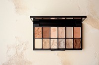 An eyeshadow palette cosmetics variation letterbox.