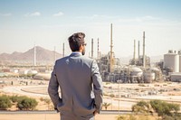 Middle eastern businessman refinery architecture outdoors. 