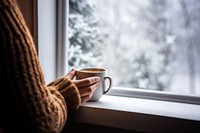 Coffee cup by the window. 