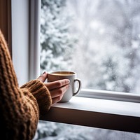 Coffee cup by the window. 