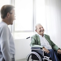 Senior man in wheelchair smiling. 