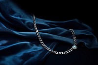 Silver chain necklace jewelry black blue.