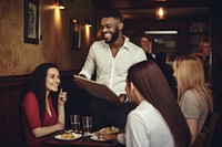 Happy waiter serving food cheerful adult togetherness. 