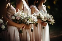 Bridesmaid wedding holding flower. 