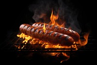 Sausage grilling cooking flame. 