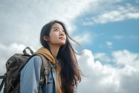 Teenager study abroad backpack looking female. 