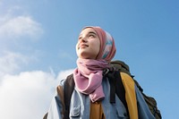 Teenager study abroad backpack looking scarf. 