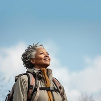 Senior woman hiking backpack looking adult. 