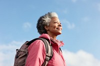 Senior woman hiking backpack looking adult. 