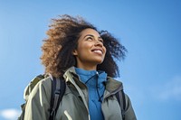 Woman hiking looking jacket smile. 