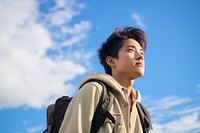 Teenager study abroad backpack looking photo. 