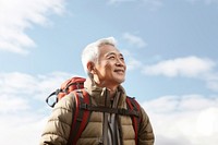 Senior man hiking looking adult sky. 