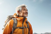 Senior man hiking backpack adult sky. AI generated Image by rawpixel.