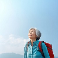 Senior woman hiking backpack looking adult. 