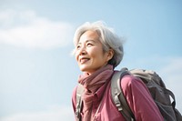 Senior woman hiking backpack looking adult. 