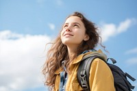 Teenager study abroad backpack looking photo. 