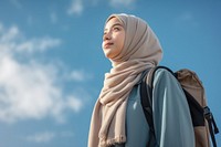 Teenager study abroad outdoors looking female. 