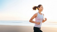 a portrait photo of a happy athletic woman jogging at sunrise by the beach. AI generated Image by rawpixel. 