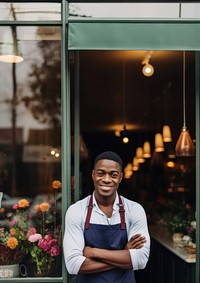 Photo of a cheerful small business owner standing and smiling in front of their shop. AI generated Image by rawpixel. 