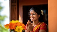 Sri Lankan woman performing a traditional welcoming gesture.  