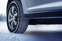 photo of Winter tire. Car on snow road.  