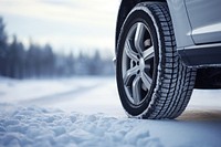 photo of Winter tire. Car on snow road.  