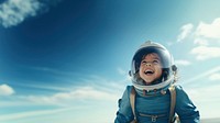 photo of smiling girl child dressed as astronaut.  