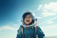 photo of smiling girl child dressed as astronaut.  