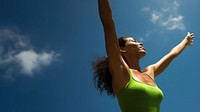 photo of mid-ages woman stretch the arms with bluesky and sun the green natual with blurred visio. AI generated Image by rawpixel. 