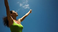 photo of mid-ages woman stretch the arms with bluesky and sun the green natual with blurred visio. AI generated Image by rawpixel. 