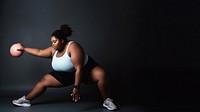 Photo of plus size woman doing fitness.  